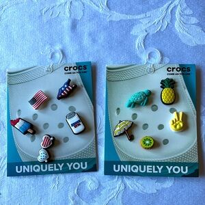 Two Sets of Crocs Charms